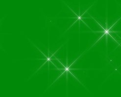 صفحه سبز متحرک با درخشش و زرق و برق، انیمیشن سه بعدی، کیفیت فوق العاده بالا، ویدیوی 4k. نور غبار سفید درخشان. پس زمینه با افکت نور بوکه. مفهوم: کریسمس، مهمانی، جشن، تولد، ویدیوی استوک