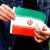 mrmiix.com_Man holding Iranian flag